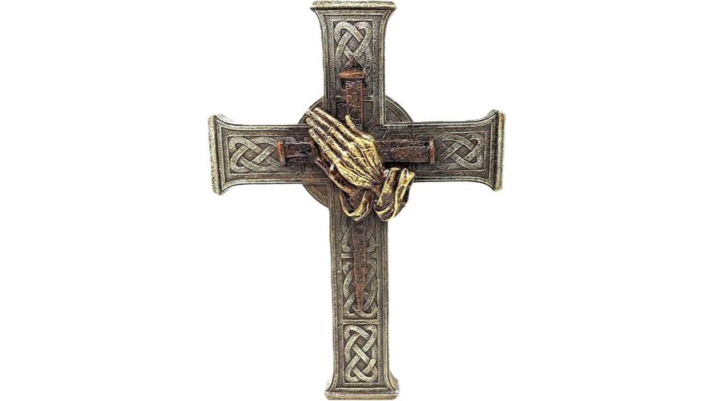 bronze cross with praying hands